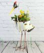 Stork Planter with White, Orange and yellow flowers