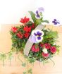 Seasonal flowers in a woven trug
