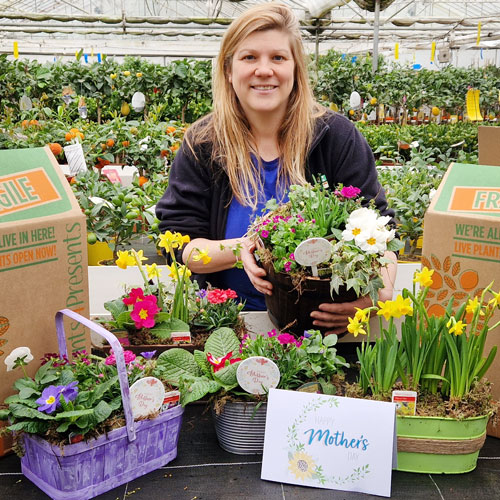 Emily with a selection of Mother's Day planters